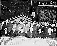 Photograph of President Truman, Secretary of State Dean Acheson, the Shah of Iran, and other dignitaries at ceremonies welcoming the Shah to Washington, during his visit to the United States., 11/16/1949 - ARC Identifier: 200145.