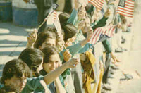 Students greet President Nixon and First Lady Patricia Nixon at Tehran Mehrabad Airport