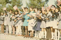 Students greet President Nixon and First Lady Patricia Nixon at Tehran Mehrabad Airport
